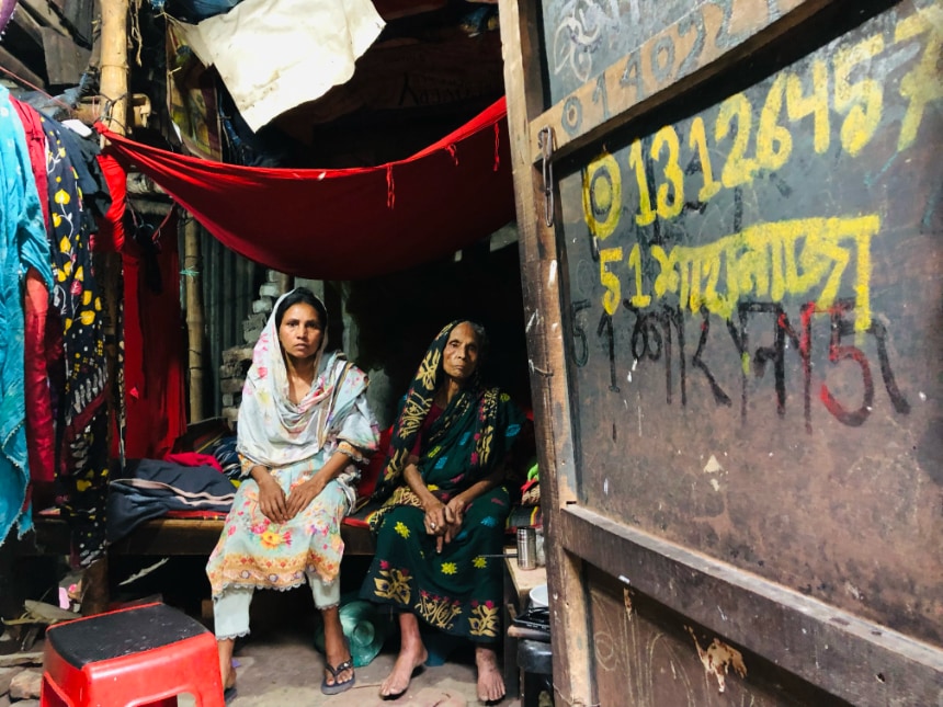 Anwara Begum with her daughter Sahana inside their home