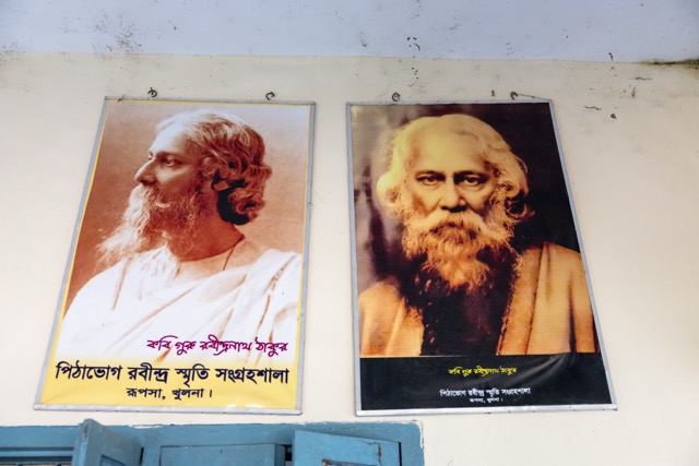Faded posters of Rabindranath Tagore hang on a stained wall inside the Rabindra Memorial Collection at Pithabhog, a quiet compound in rural Khulna, Bangladesh, that honours the poet’s ancestral Kushari roots. Photo: Nayem Ali